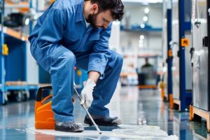 bluecollar-technician-inspecting-maintaining-industrial-equipment-factory-workspace_924727-18227